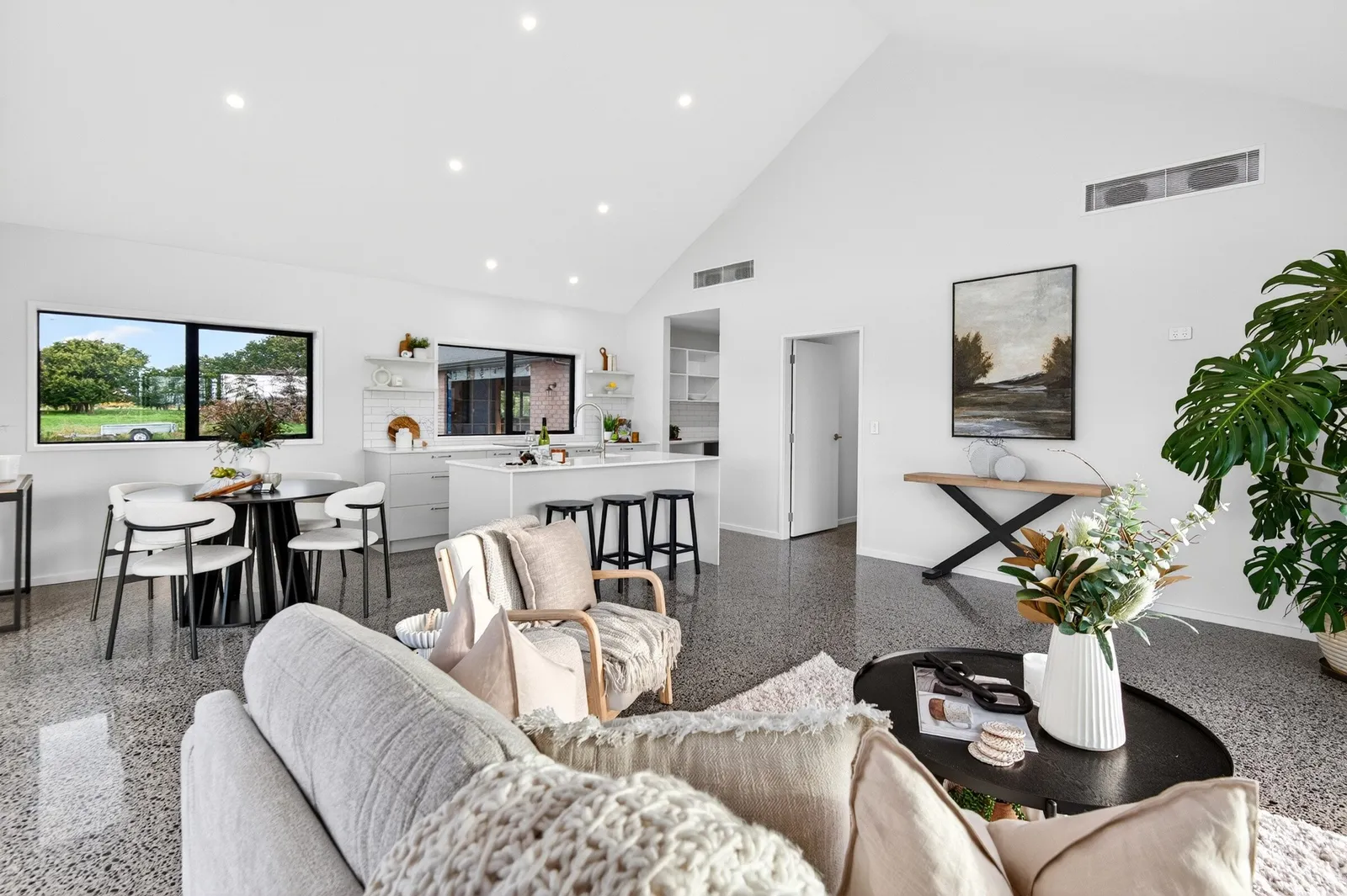 Light filled living space & kitchen in Gordonton Road new build by Whitechurch Construction, Te Awamutu builders.